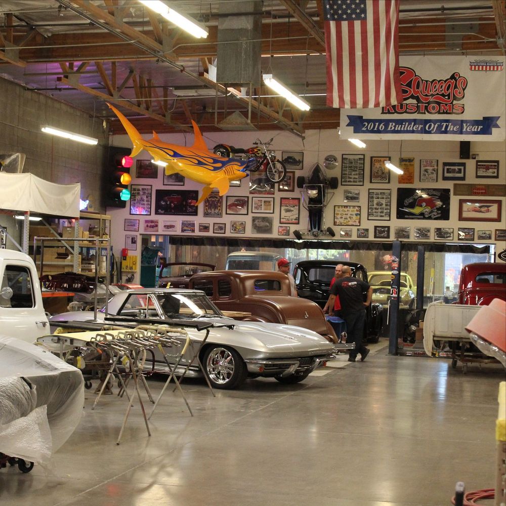 Wide view of the Squeeg’s Kustoms shop floor with builds in progress